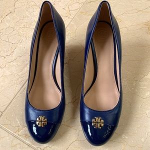 Never worn beautiful Tory Burch wedges. Dust bag included